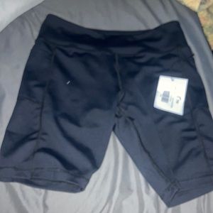 Zyia black light n tight pocket 8” shorts NWT